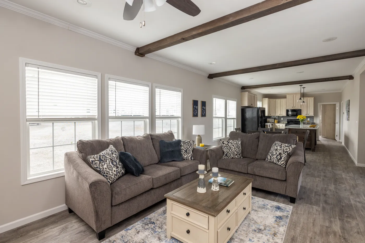 The THE ROGUE Living Room. This Manufactured Mobile Home features 3 bedrooms and 2 baths.
