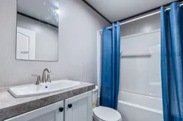 The COLOSSAL Guest Bathroom. This Manufactured Mobile Home features 3 bedrooms and 2 baths.