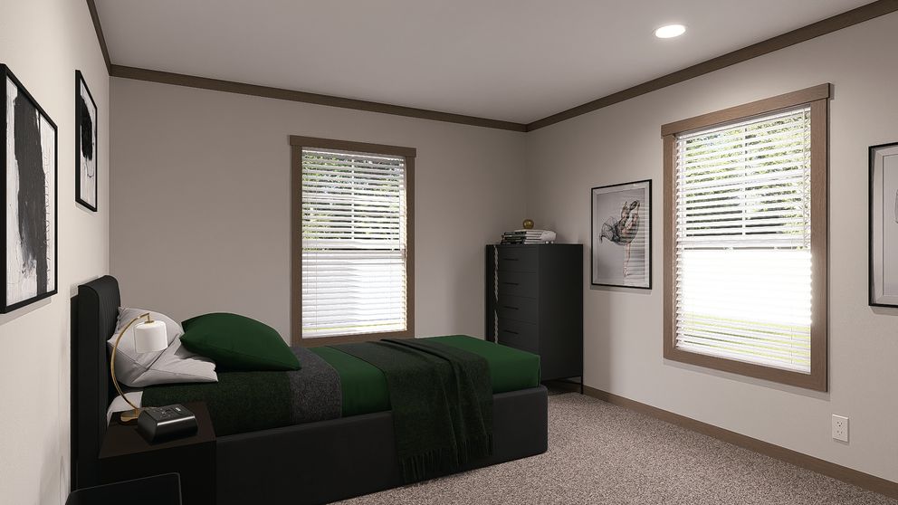 The EVERETT ELITE Guest Bedroom. This Manufactured Mobile Home features 4 bedrooms and 3 baths.