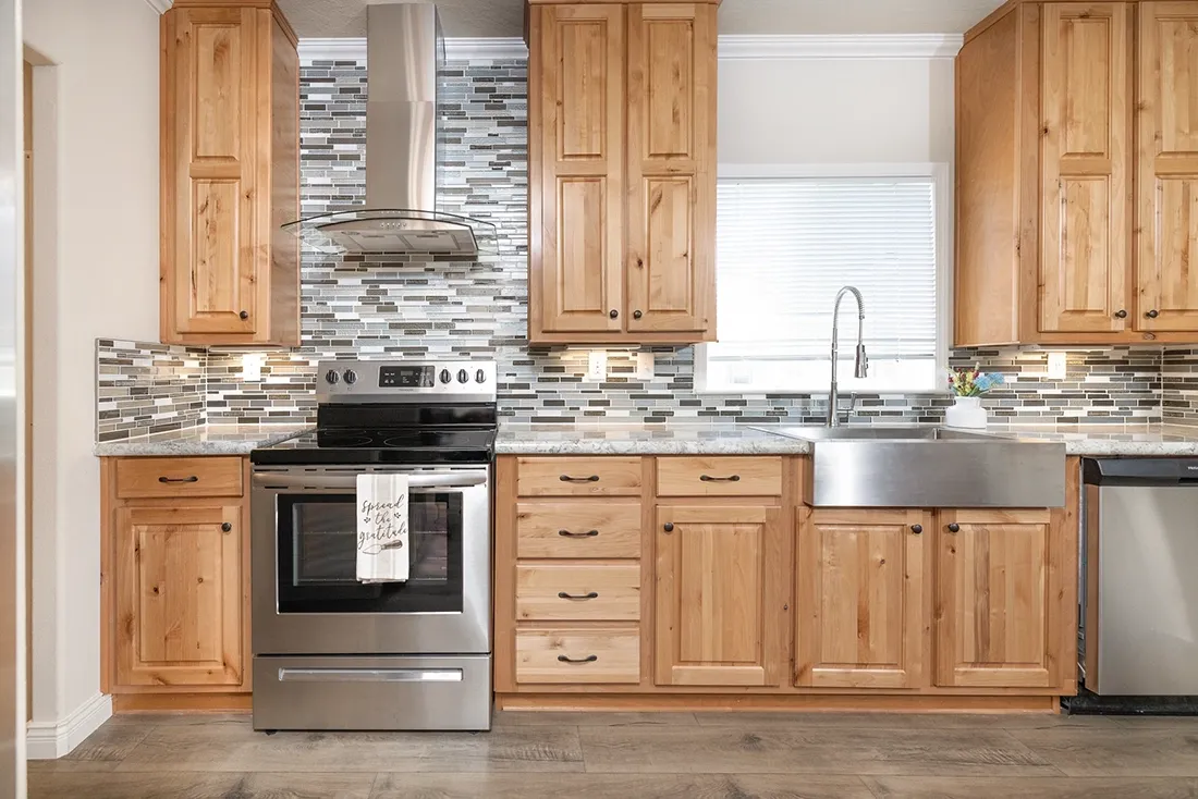 The TH601F                 CLAYTON Kitchen. This Manufactured Mobile Home features 3 bedrooms and 2 baths.