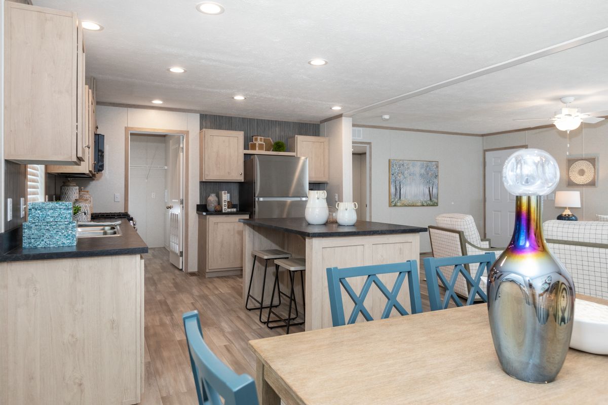 The 5628-5202 ADRENALINE Kitchen. This Manufactured Mobile Home features 3 bedrooms and 2 baths.