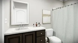The HUXTON II Guest Bathroom. This Manufactured Mobile Home features 4 bedrooms and 2 baths.