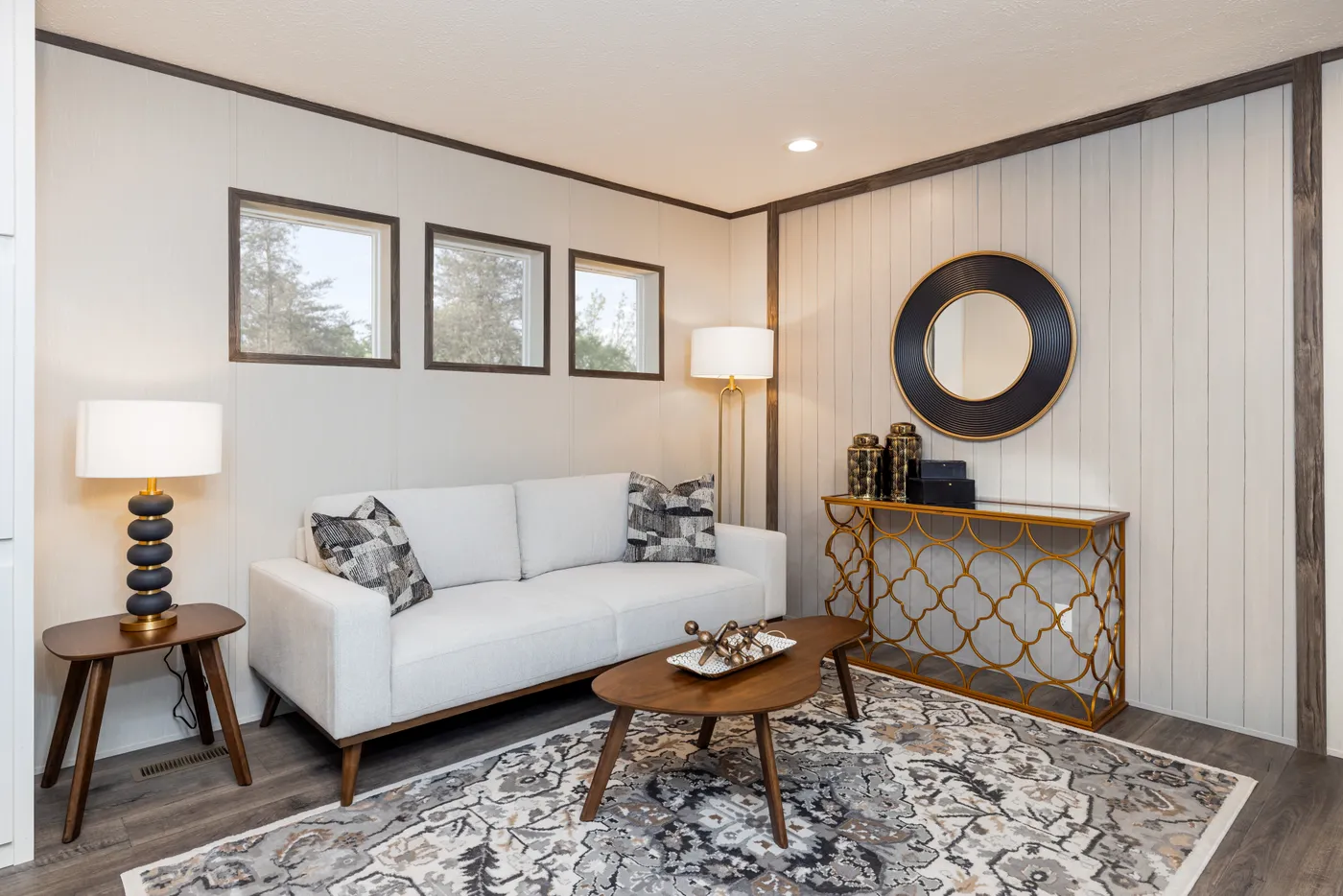 The INTUITION Living Room. This Manufactured Mobile Home features 3 bedrooms and 2 baths.