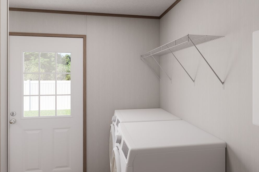The ULTRA FLEX Utility Room. This Manufactured Mobile Home features 3 bedrooms and 2 baths.