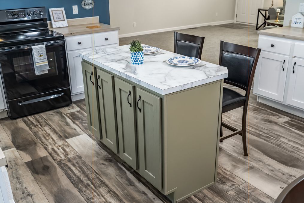 The BROOKLINE FLEX 32 WIDE Kitchen. This Manufactured Mobile Home features 4 bedrooms and 3 baths.