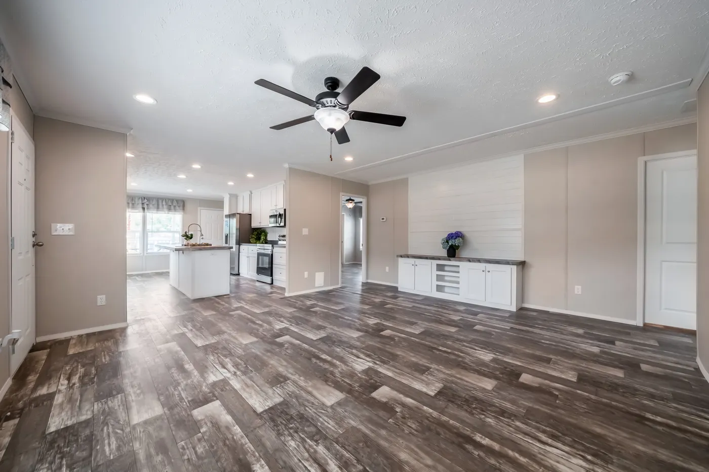 The NORTHSHORE Living Room. This Manufactured Mobile Home features 3 bedrooms and 2 baths.