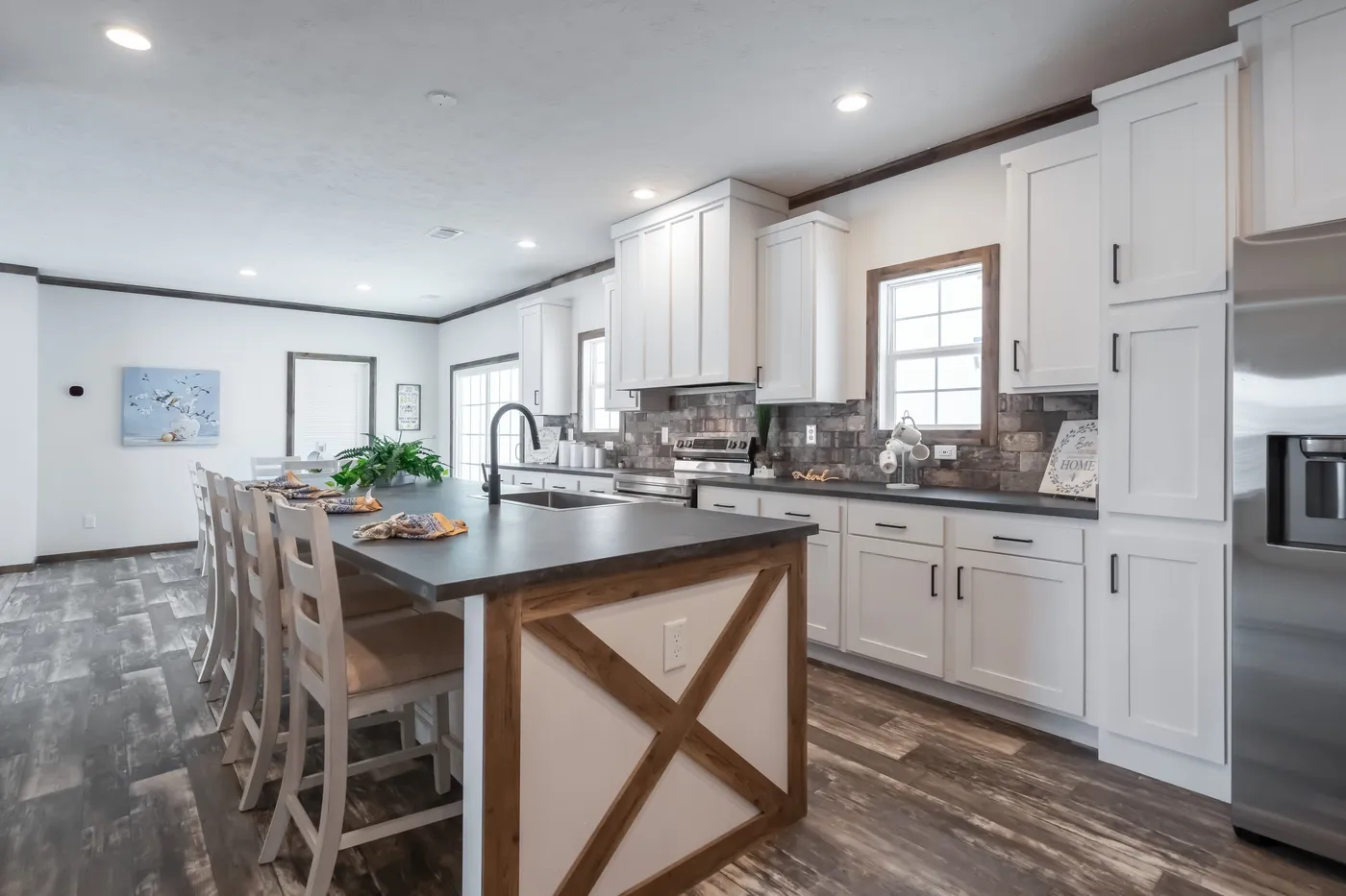 The 3237 THE TYBEE HUD Kitchen. This Manufactured Mobile Home features 4 bedrooms and 3 baths.