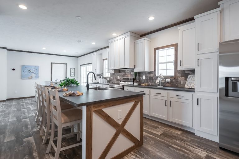 The 3237 THE TYBEE HUD Kitchen. This Manufactured Mobile Home features 4 bedrooms and 3 baths.