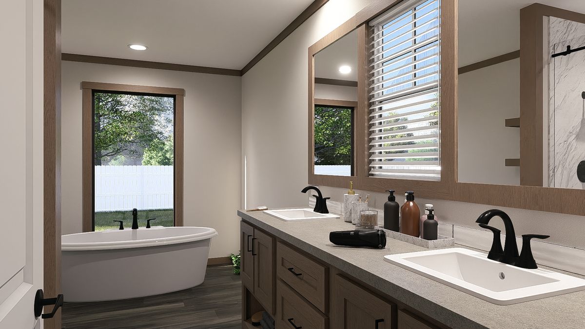 The EMILIE ELITE Primary Bathroom. This Manufactured Mobile Home features 3 bedrooms and 2 baths.