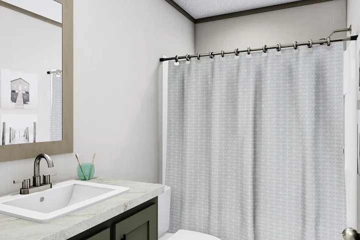 The BOONE Guest Bathroom. This Manufactured Mobile Home features 4 bedrooms and 2 baths.
