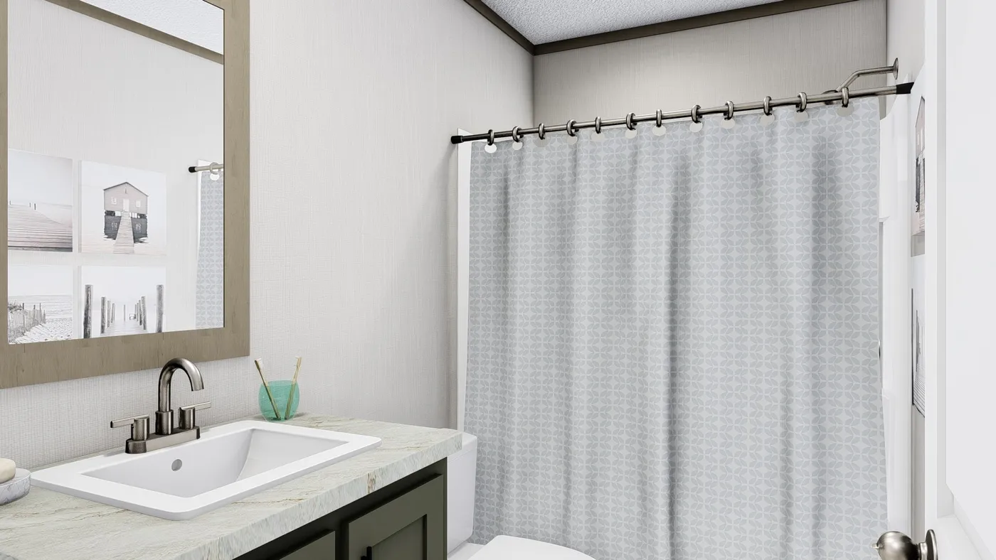 The BOONE Guest Bathroom. This Manufactured Mobile Home features 4 bedrooms and 2 baths.