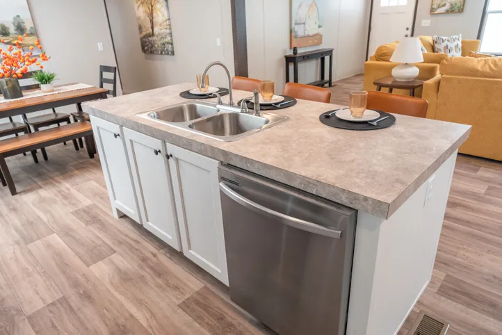 The EMPOWER Kitchen. This Manufactured Mobile Home features 4 bedrooms and 2 baths.