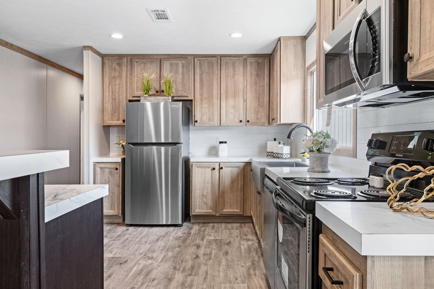 The CRAZY EIGHTS Kitchen. This Manufactured Mobile Home features 4 bedrooms and 2 baths.