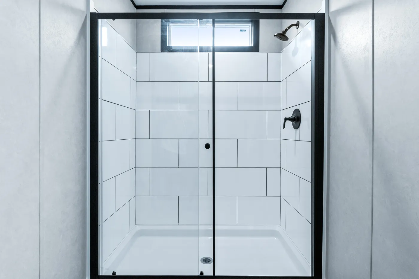 The ODYSSEY Primary Bathroom. This Manufactured Mobile Home features 4 bedrooms and 2 baths.