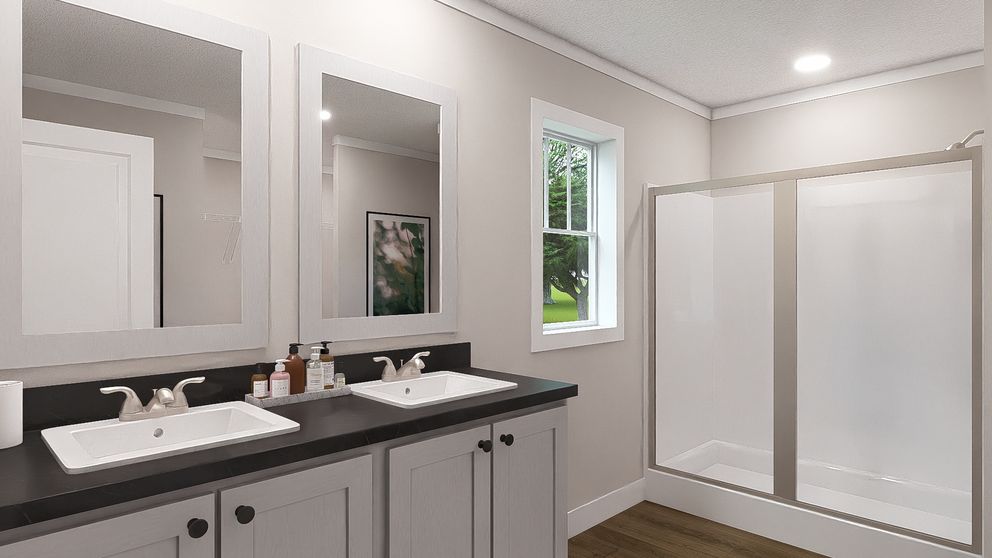 The LET IT BE Primary Bathroom. This Modular Home features 3 bedrooms and 2 baths.
