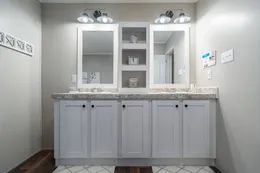 The TRADITION 72 Primary Bathroom. This Manufactured Mobile Home features 4 bedrooms and 2 baths.