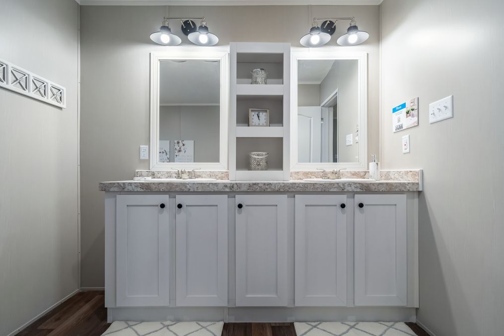 The TRADITION 72 Primary Bathroom. This Manufactured Mobile Home features 4 bedrooms and 2 baths.