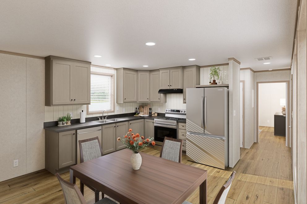 The 7616-CC01 CORNERSTONE 76 Kitchen. This Manufactured Mobile Home features 3 bedrooms and 2 baths.