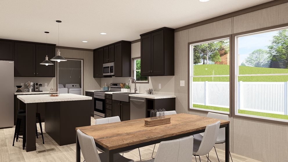 The ULTRA PRO 3 BR 28X60 Dining Area. This Manufactured Mobile Home features 3 bedrooms and 2 baths.