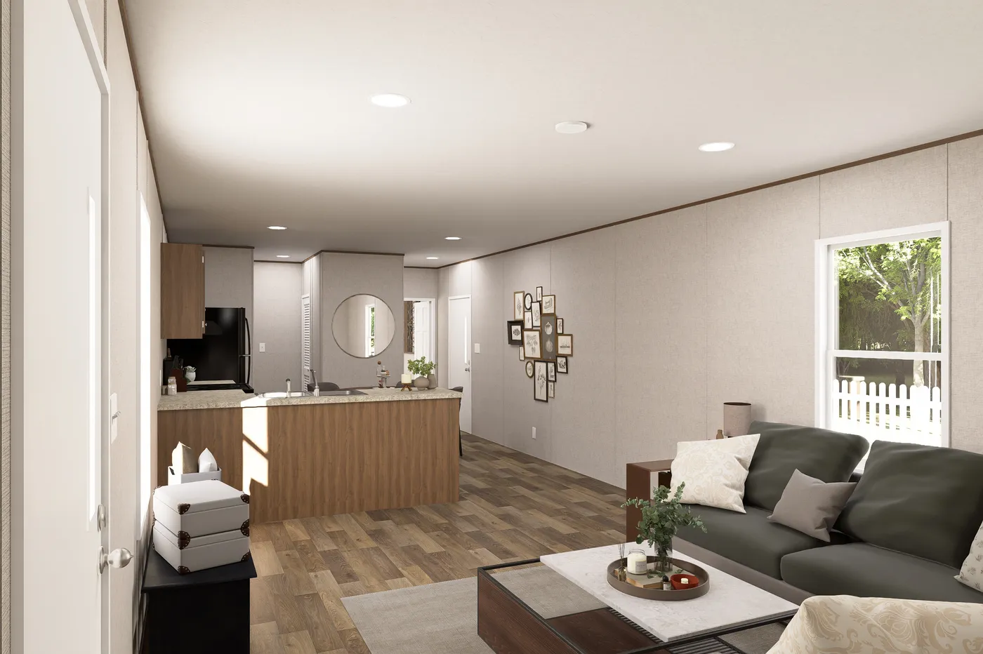 The MAGNOLIA Living Room. This Manufactured Mobile Home features 3 bedrooms and 2 baths.