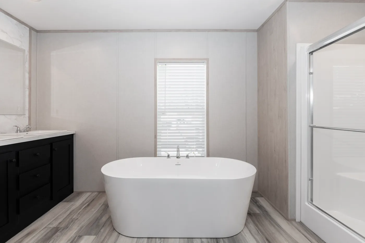 The THE THUNDERHEAD Primary Bathroom. This Manufactured Mobile Home features 3 bedrooms and 2 baths.