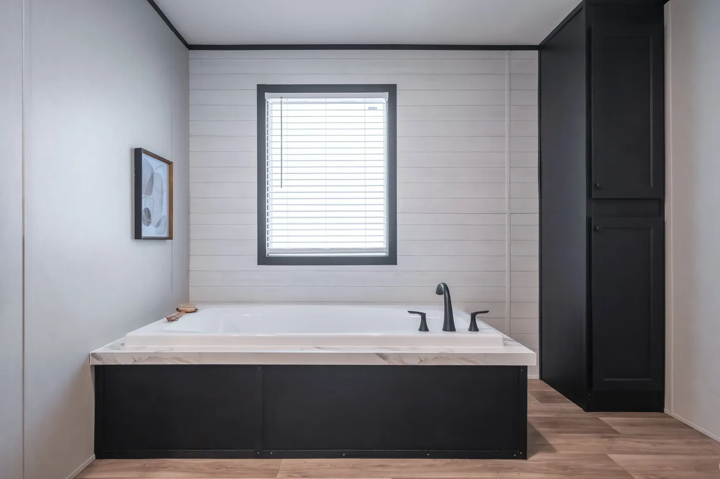 The ABSOLUTE VALUE Primary Bathroom. This Manufactured Mobile Home features 4 bedrooms and 2 baths.