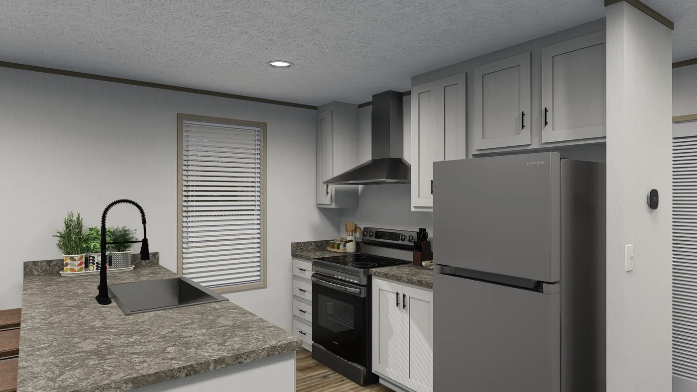 The ALBANY Kitchen. This Manufactured Mobile Home features 3 bedrooms and 2 baths.