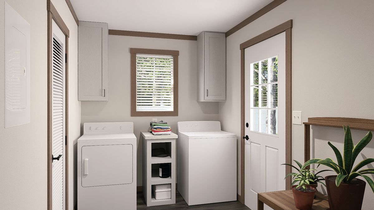 The WILDER Utility Room. This Manufactured Mobile Home features 3 bedrooms and 2 baths.