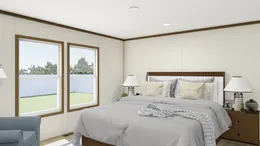 The OCCASSION Primary Bedroom. This Manufactured Mobile Home features 4 bedrooms and 2 baths.