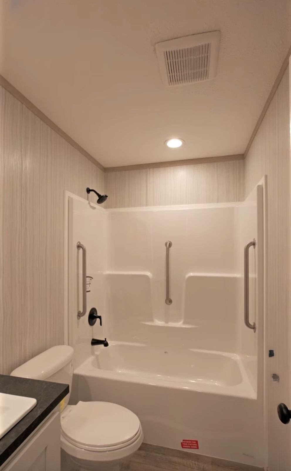 The TURQUOISE Guest Bathroom. This Manufactured Mobile Home features 2 bedrooms and 2 baths.