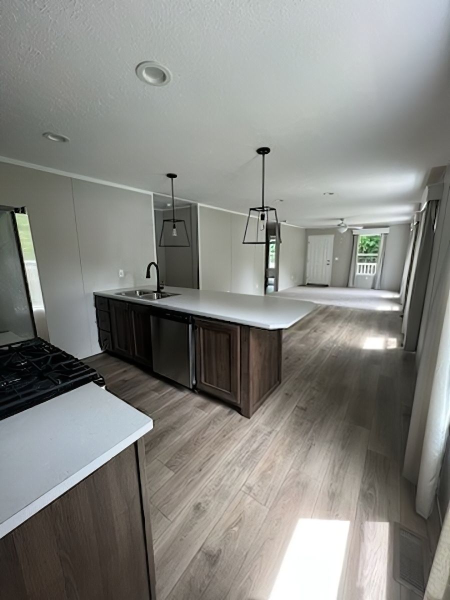 The JADE 40 Kitchen. This Manufactured Mobile Home features 2 bedrooms and 2 baths.
