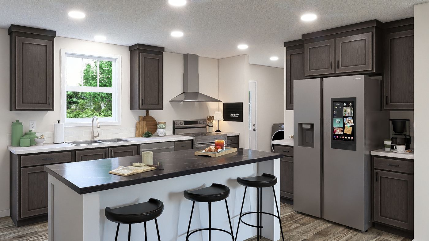 The ECLIPSE BLVD 6028-MS063 SECT Kitchen. This Manufactured Mobile Home features 3 bedrooms and 2 baths.