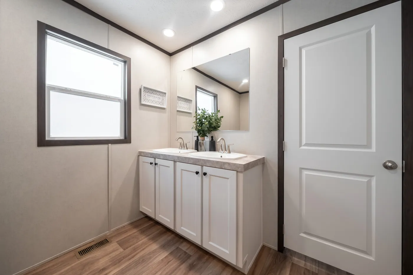 The ESSENCE Guest Bathroom. This Manufactured Mobile Home features 3 bedrooms and 2 baths.