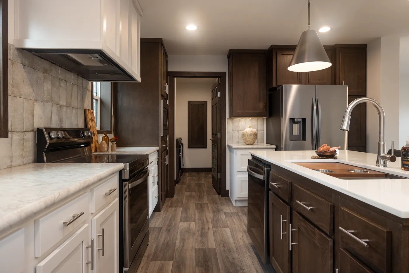 The LEGEND 78 Kitchen. This Manufactured Mobile Home features 3 bedrooms and 2 baths.