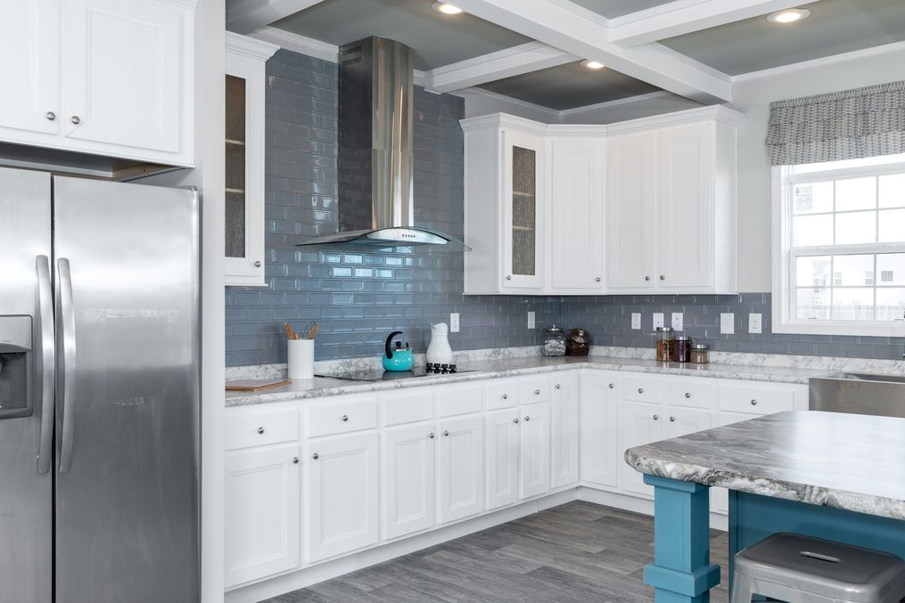 The SUPER 68 ELITE Kitchen. This Manufactured Mobile Home features 3 bedrooms and 2 baths.