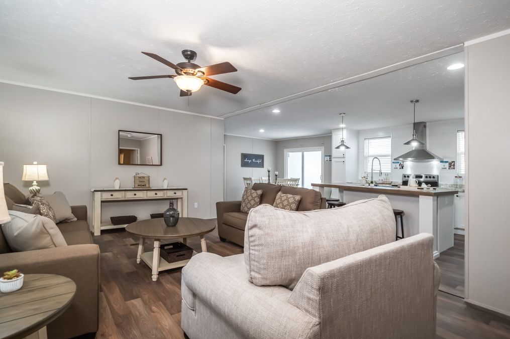 The TRADITION 72 Family Room. This Manufactured Mobile Home features 4 bedrooms and 2 baths.
