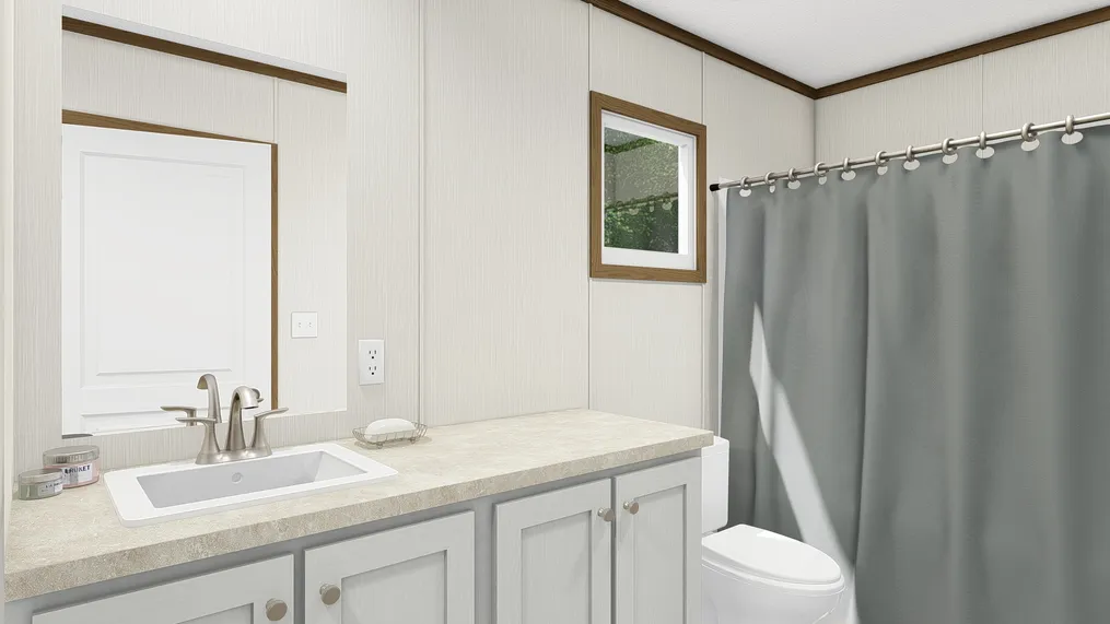 The SPIRIT Primary Bathroom. This Manufactured Mobile Home features 2 bedrooms and 2 baths.