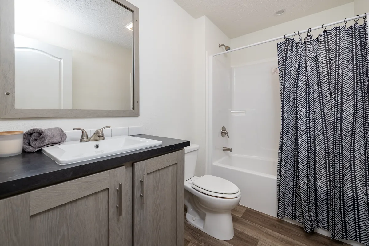 The ROOSEVELT MOD Guest Bathroom. This Modular Home features 3 bedrooms and 2 baths.