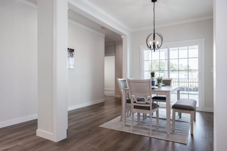 The 3459 HUD 64X28 CAROLINA Dining Room. This Manufactured Mobile Home features 3 bedrooms and 2 baths.