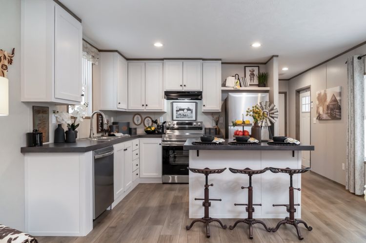 The HORIZON BEACON 16663A Kitchen. This Manufactured Mobile Home features 3 bedrooms and 2 baths.