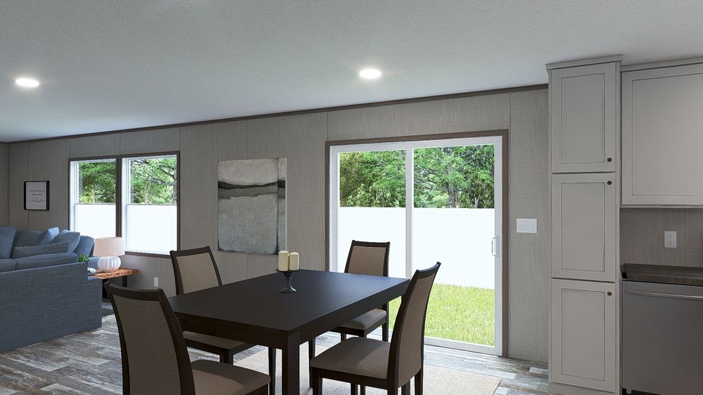 The ULTRA PRO BIG BOY 4 BR 32X76 Dining Area. This Manufactured Mobile Home features 4 bedrooms and 2 baths.