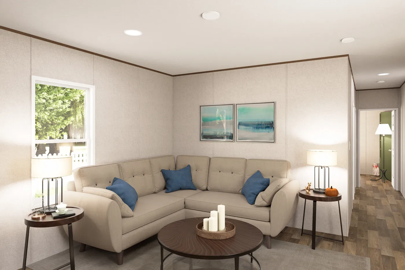 The HICKORY Living Room. This Manufactured Mobile Home features 3 bedrooms and 2 baths.