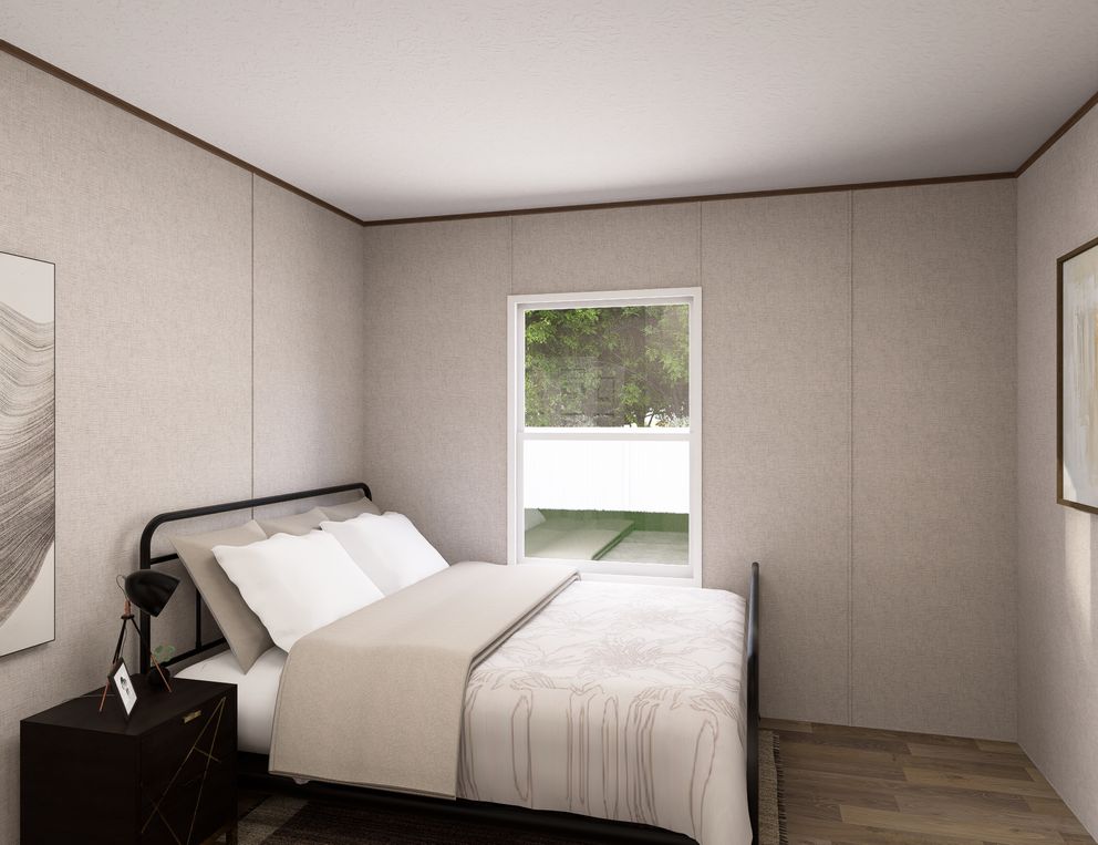 The SYCAMORE Guest Bedroom. This Manufactured Mobile Home features 4 bedrooms and 2 baths.