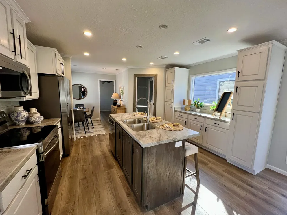 The THE TRUMAN Kitchen. This Manufactured Mobile Home features 3 bedrooms and 2 baths.