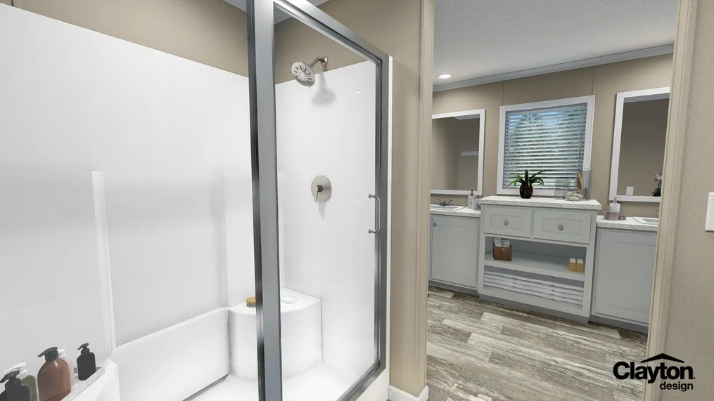 The SWEET BREEZE 64 Primary Bathroom. This Manufactured Mobile Home features 3 bedrooms and 2 baths.