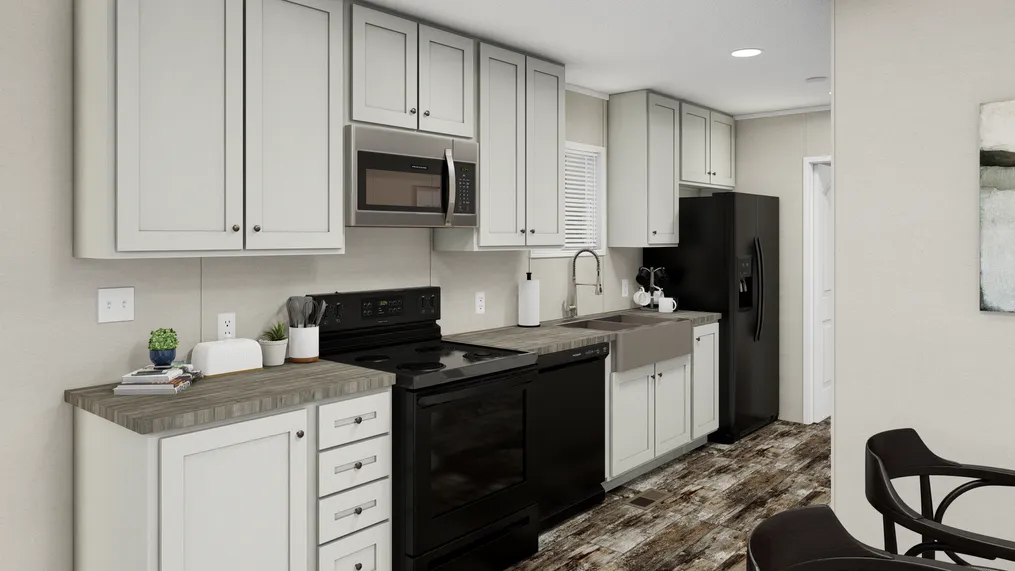 The ANNIVERSARY  EXCEL Kitchen. This Manufactured Mobile Home features 3 bedrooms and 2 baths.
