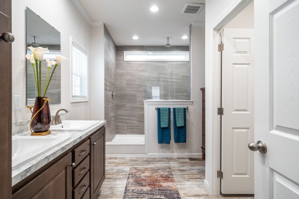 The 1444 CAROLINA Primary Bathroom. This Manufactured Mobile Home features 4 bedrooms and 2 baths.