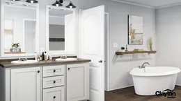 The THE RESERVE 76 Primary Bathroom. This Manufactured Mobile Home features 4 bedrooms and 2 baths.