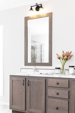 The COUNTRY AIRE Primary Bathroom. This Manufactured Mobile Home features 3 bedrooms and 3 baths.
