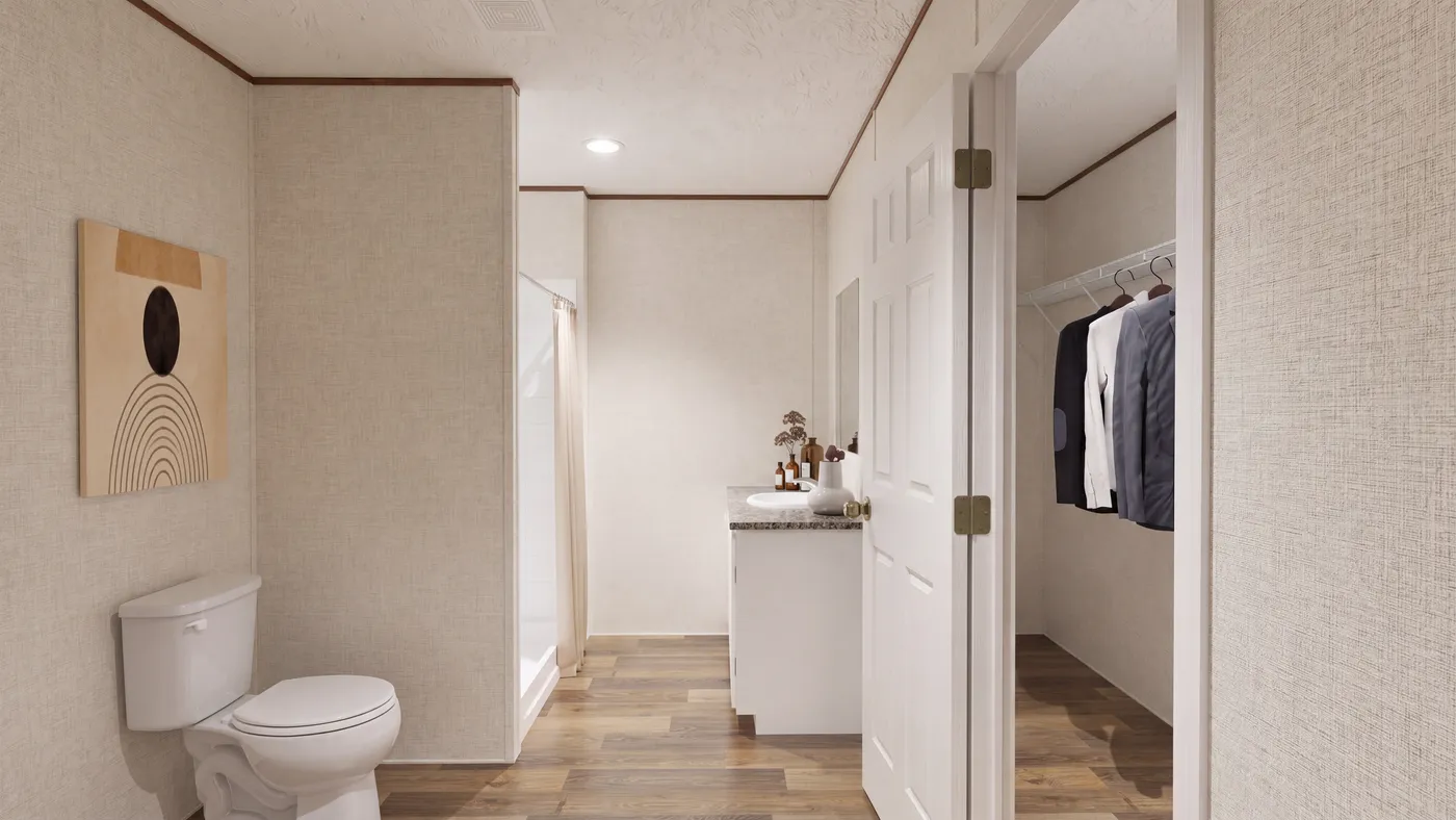 The SYCAMORE Primary Bathroom. This Manufactured Mobile Home features 4 bedrooms and 2 baths.